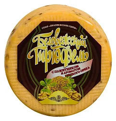 Сыр БЕЛОВЕЖСКИЙ ТРЮФЕЛЬ с пажитником и грецким орехом бзмж 45%